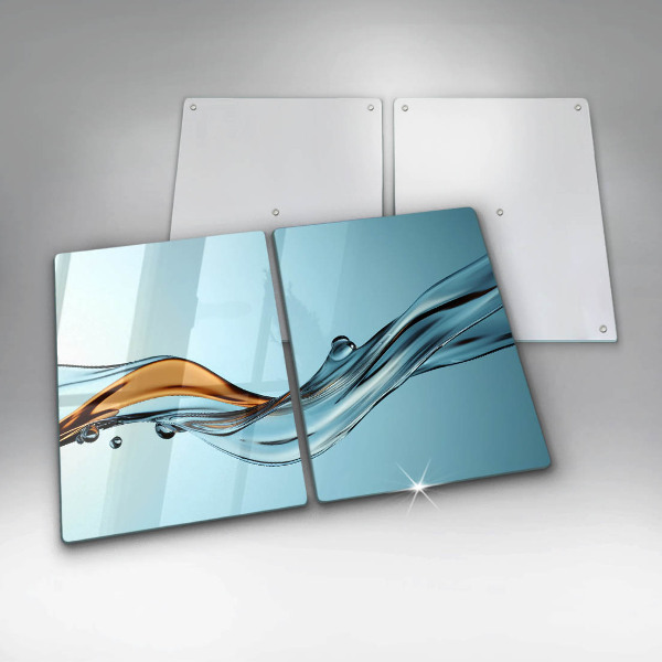 Tocător sticlă Apă pe un fundal albastru