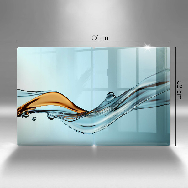 Tocător sticlă Apă pe un fundal albastru