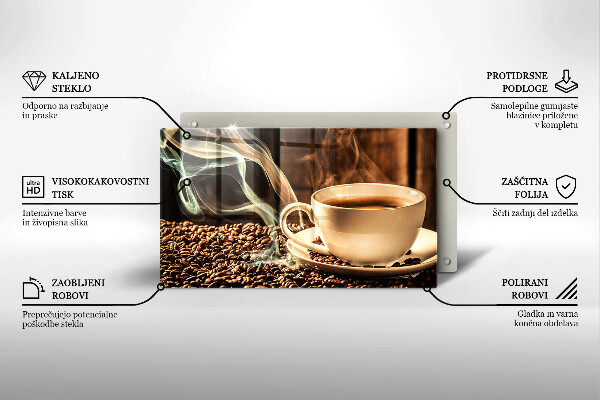 Tocător din sticlă ceașcă și boabe de cafea