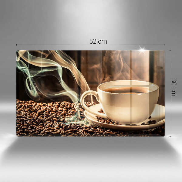 Tocător din sticlă ceașcă și boabe de cafea