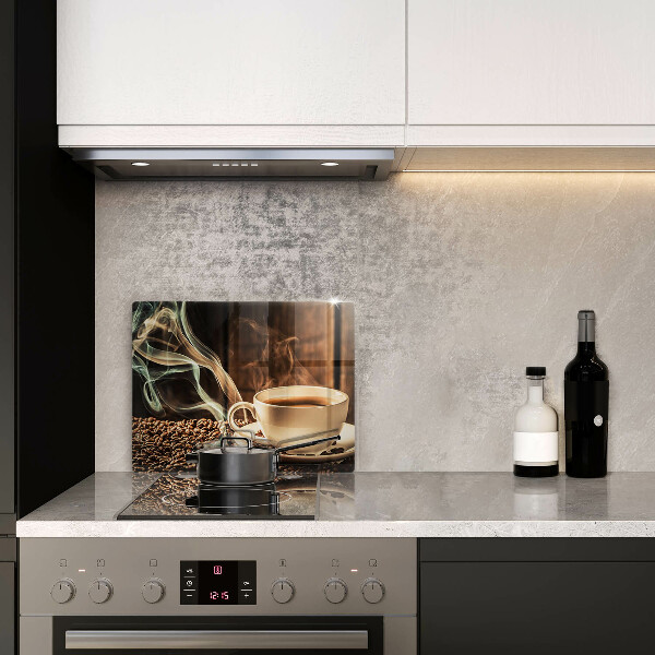 Tocător din sticlă ceașcă și boabe de cafea