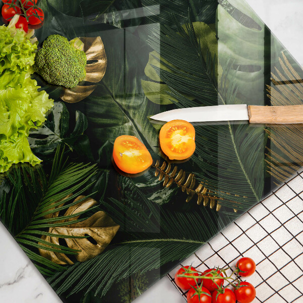 Placă din sticla protectie perete Frunze de monstera aurii