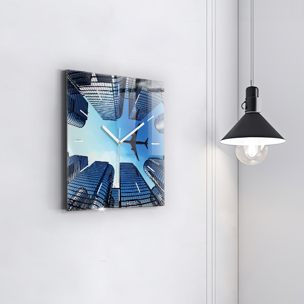 Ceas pătrat de perete din sticlă Avionul deasupra clădirilor