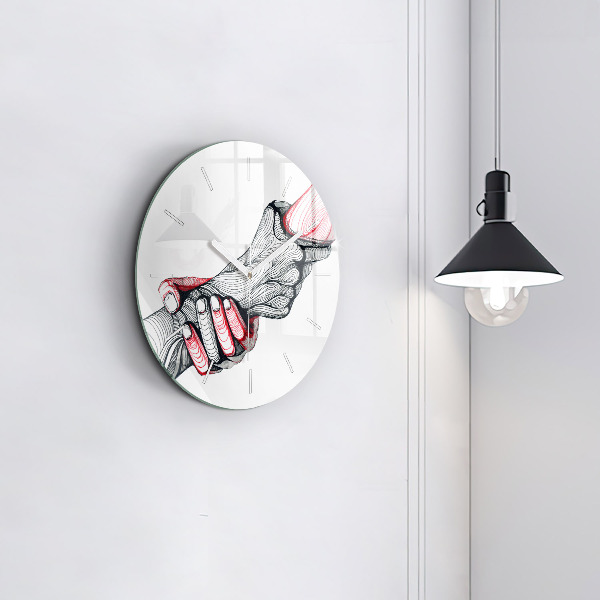 Ceas rotund de perete din sticlă ținându-se de mână